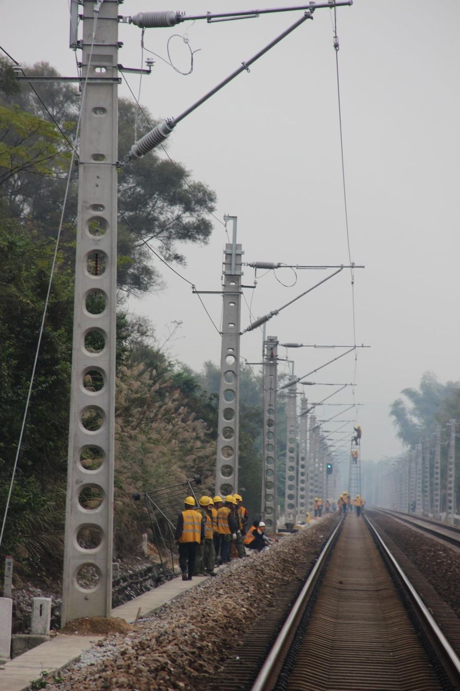 H-section prestressed concrete catenary masts in service on an electrified railway