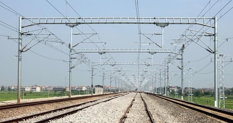 Steel portal structures on an electrified railway